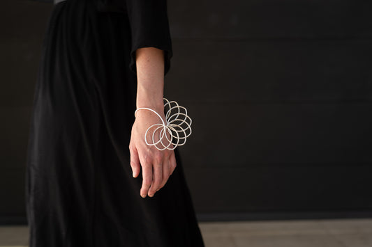 B-Linea-2-910 | Curly flare statement bangle -heavy